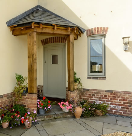 Timber front door in traditionally styled new build